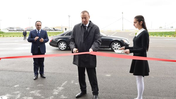 Ильхам Алиев принял участие в открытии Музыкального центра в городе Агстафа - Sputnik Азербайджан