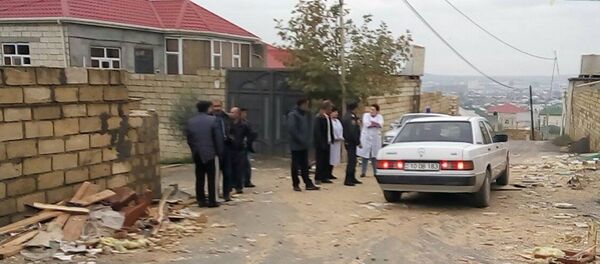Врачи и полицейские на месте трагедии Врачи и полицейские на месте трагедии - Sputnik Азербайджан