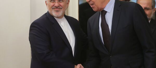 Встреча глав МИД России, Ирана и Сирии С. Лаврова, М. Зарифа и В. Муаллема - Sputnik Азербайджан