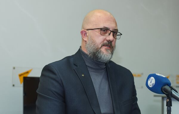 Российский политолог Евгений Михайлов Российский политолог Евгений Михайлов - Sputnik Азербайджан