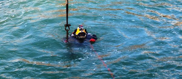 Водолазы на месте поисковых работ, архивное фото - Sputnik Азербайджан