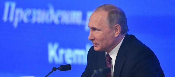Двенадцатая ежегодная большая пресс-конференция президента РФ Владимира Путина - Sputnik Азербайджан