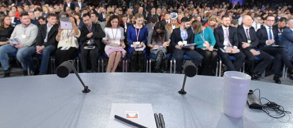 Двенадцатая ежегодная большая пресс-конференция президента РФ Владимира Путина - Sputnik Азербайджан