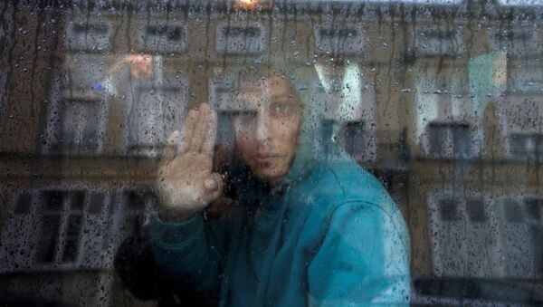 Мигрант из Афганистана во Франции, фото из архива - Sputnik Азербайджан