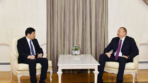 Президент Азербайджана Ильхам Алиев принял генерального секретаря Всемирной таможенной организации (ВТО) Кунио Микурию - Sputnik Азербайджан