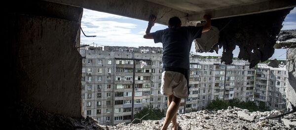 Фотокорреспондент Sputnik Валерий Мельников занял первое место на конкурсе World Press Photo 2016 Фотокорреспондент Sputnik Валерий Мельников занял первое место на конкурсе World Press Photo 2016 - Sputnik Азербайджан