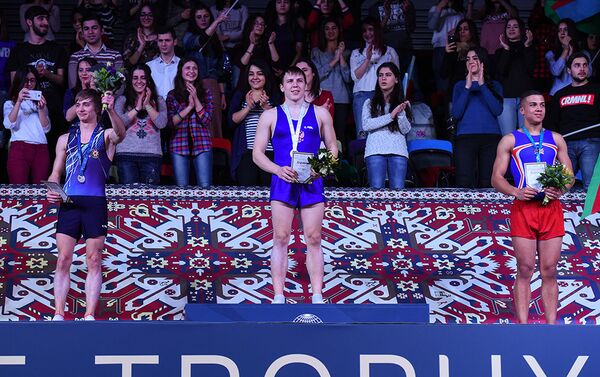 Михаил Малкин завоевал серебряную медаль Кубка мира по прыжкам на батуте и тамблингу - Sputnik Азербайджан