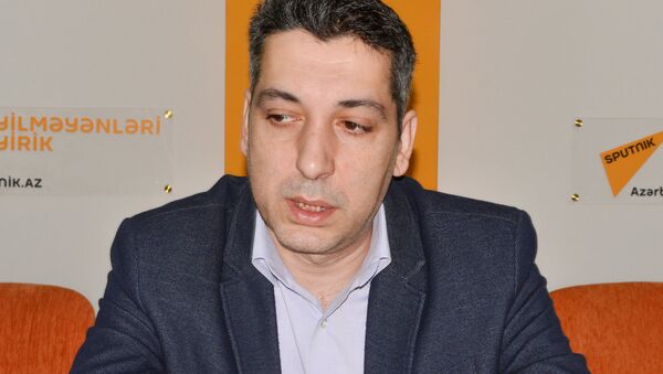 Редактор онйлан-издания Vzglyad.az Кенан Гулузаде - Sputnik Азербайджан
