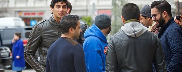 Приезжие с Ближнего Востока на одной из тбилисских улиц Приезжие с Ближнего Востока на одной из тбилисских улиц - Sputnik Азербайджан
