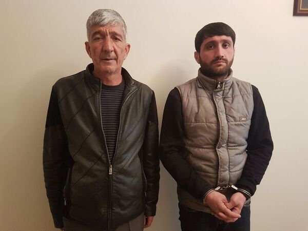 Задержанные Гюндюз Гулиев (слева) и Эльгюн Исмаил-Неджат Задержанные Гюндюз Гулиев (слева) и Эльгюн Исмаил-Неджат - Sputnik Азербайджан