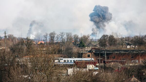 Последствия пожара на складе боеприпасов в Харьковской области - Sputnik Азербайджан