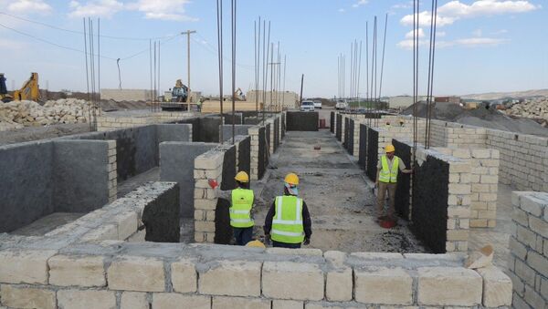 В Джоджуг Марджанлы завершились работы по кладке стен 21 дома - Sputnik Азербайджан