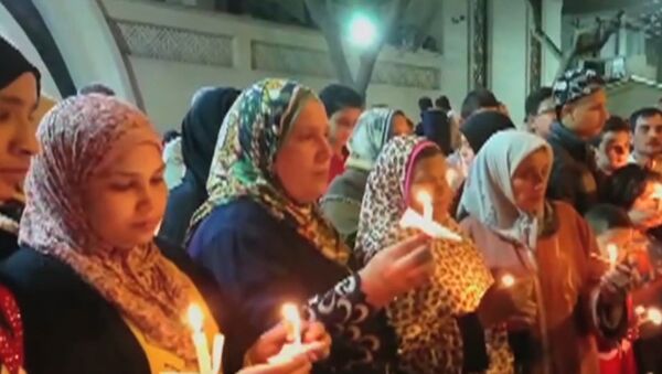 В Египте зажгли свечи в память о жертвах терактов - Sputnik Азербайджан