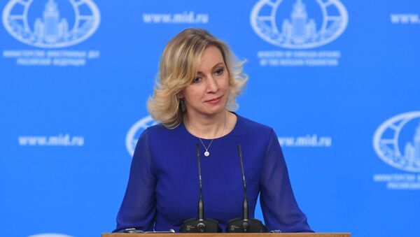 Официальный представитель министерства иностранных дел России Мария Захарова на брифинге по текущим вопросам внешней политики - Sputnik Азербайджан