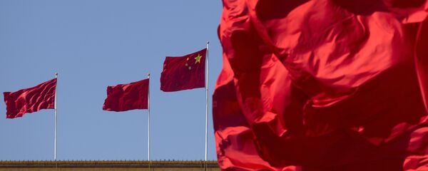 Флаги Китая на здании Дома народных собраний в Пекине, фото из архива Флаги Китая на здании Дома народных собраний в Пекине, фото из архива - Sputnik Азербайджан