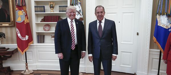 Президент США Дональд Трамп и министр иностранных дел России Сергей Лавров - Sputnik Азербайджан