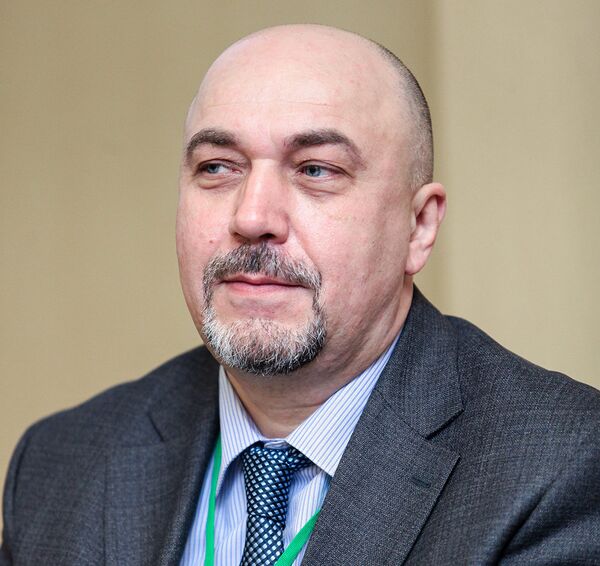 Эксперт-аналитик ГК ФИНАМ Алексей Калачев Эксперт-аналитик ГК ФИНАМ Алексей Калачев - Sputnik Азербайджан