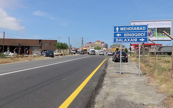Автомобильная дорога Бинагади – Мехтиабад в Бинагадинском районе Баку после ремонта - Sputnik Азербайджан