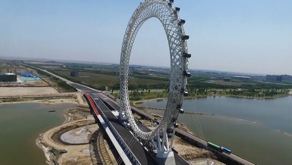 В Китае открылось новое гигантское колесо обозрения - Sputnik Азербайджан