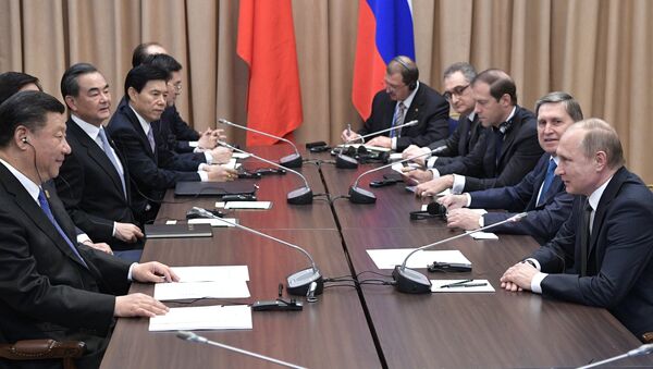 Russian President Vladimir Putin and Xi Jinping, President of the People's Republic of China (PRC), at a meeting in Astana - Sputnik Azərbaycan