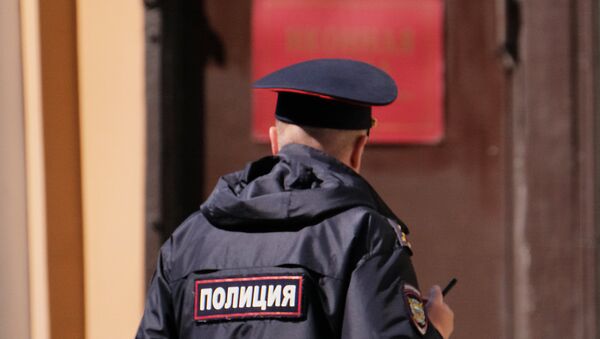 Сотрудник полиции на улице Москвы, фото из архива - Sputnik Azərbaycan