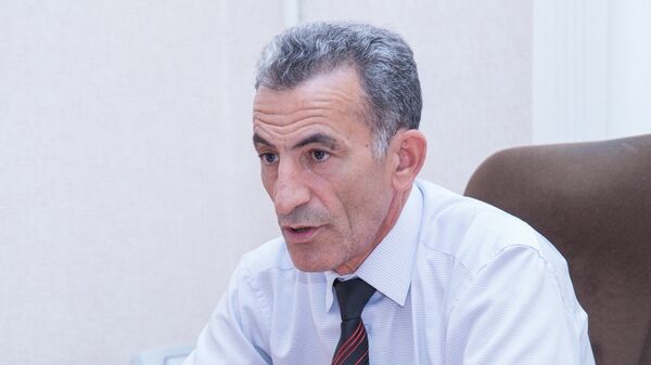 Начальник отдела Республиканского центра гигиены и эпидемиологии Зияддин Кязимов - Sputnik Азербайджан