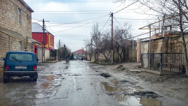 Городская дорога после дождя - Sputnik Азербайджан