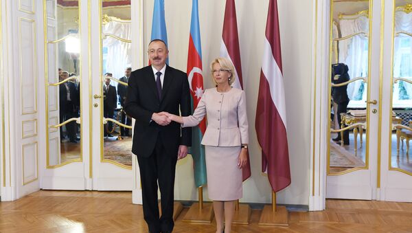 Президент Азербайджана Ильхам Алиев и председатель Сейма Латвии Инара Мурниеце - Sputnik Азербайджан