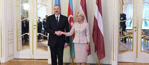 Президент Азербайджана Ильхам Алиев и председатель Сейма Латвии Инара Мурниеце - Sputnik Азербайджан
