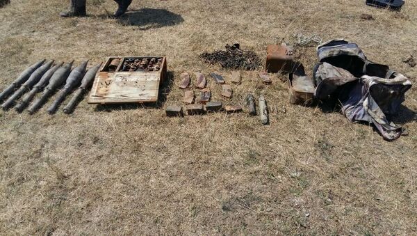 Боеприпасы, обнаруженные в селе Сеюдлю Гедабейского района - Sputnik Азербайджан