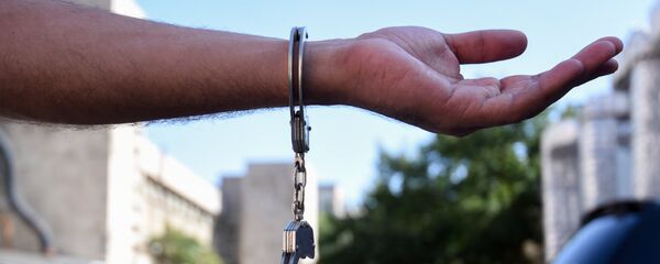 Наручники, фото из архива Наручники, фото из архива - Sputnik Азербайджан