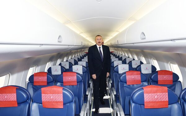 İlham Əliyev “Buta Airways” aviaşirkətinin “Embraer 190” təyyarəsi ilə tanış olub - Sputnik Azərbaycan