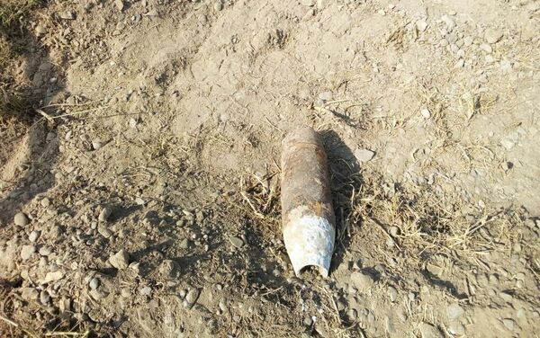 Обнаруженный на месте операции артиллерийский снаряд - Sputnik Азербайджан