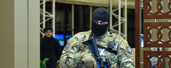 Сотрудник Службы государственной безопасности Азербайджана, фото из архива Сотрудник Службы государственной безопасности Азербайджана, фото из архива - Sputnik Азербайджан