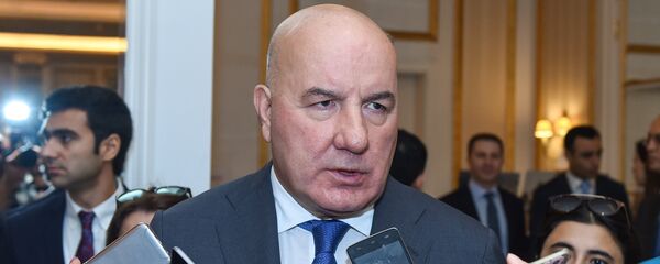 Председатель правления Центрального банка АР Эльман Рустамов Председатель правления Центрального банка АР Эльман Рустамов - Sputnik Азербайджан