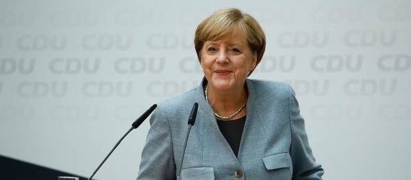 Ангела Меркель во время пресс-конференции по итогам выборов, Берлин, 25 сентября 2017 года Ангела Меркель во время пресс-конференции по итогам выборов, Берлин, 25 сентября 2017 года - Sputnik Азербайджан