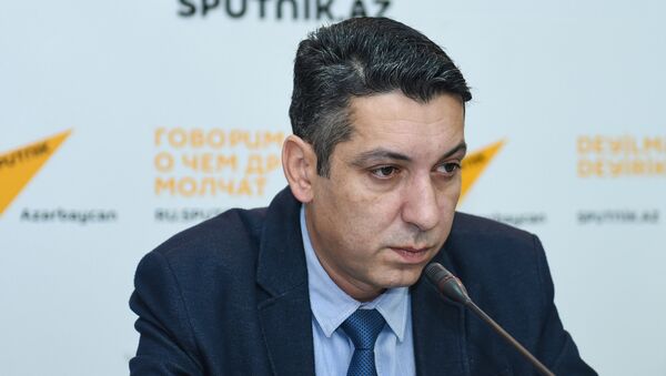 Пресс-секретарь Нацбюро Кенан Гулузаде - Sputnik Азербайджан