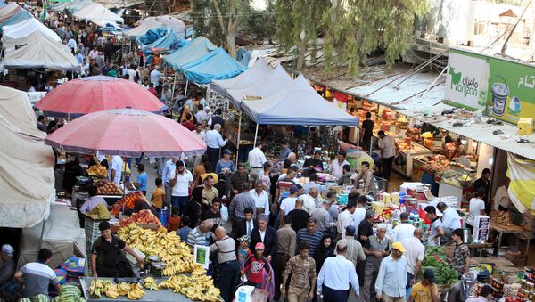 Курды на рынке в Эрбиле, Ирак, 4 октября 2017 года - Sputnik Азербайджан