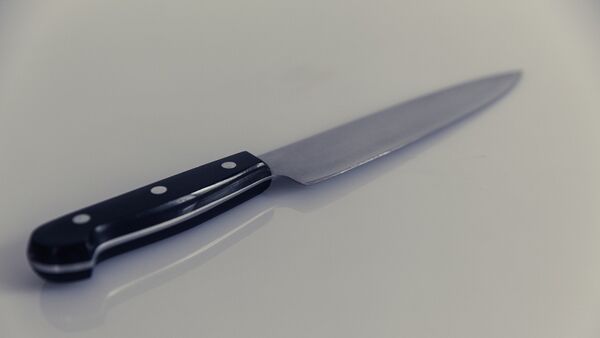 Удар ножом, фото из архива - Sputnik Azərbaycan