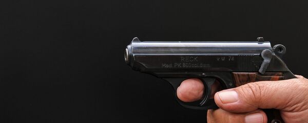 Пистолет в руке, фото из архива Пистолет в руке, фото из архива - Sputnik Азербайджан
