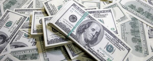 Денежные купюры: доллары США Денежные купюры: доллары США - Sputnik Азербайджан