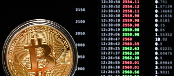 Криптовалюта биткойн, фото из архива Криптовалюта биткойн, фото из архива - Sputnik Азербайджан