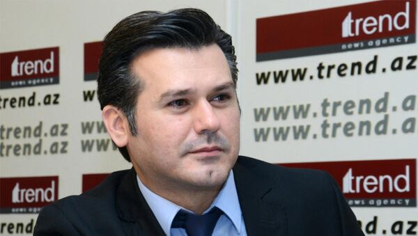 глава Арабской службы новостей агентства Trend Руфиз Хафизоглу - Sputnik Азербайджан