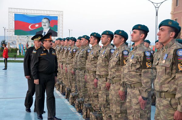 Азербайджанские миротворцы вернулись из Афганистана Азербайджанские миротворцы вернулись из Афганистана - Sputnik Азербайджан