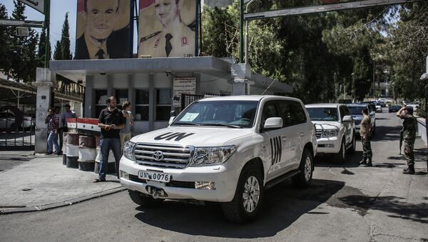 Инспекторы ООН по химоружию прибыли в военный госпиталь в Дамаске, где проходят лечение военнослужащие сирийской правительственной армии, пострадавшие от возможной химической атаки, 30 августа 2013 года - Sputnik Азербайджан