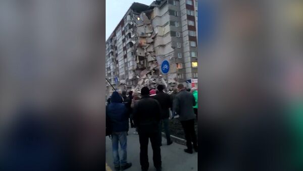 Многоэтажный жилой дом обрушился в Ижевске - Sputnik Азербайджан