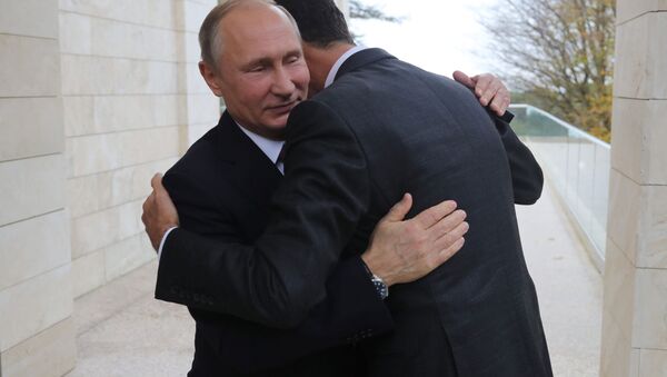Rusya Devlet Başkanı Vladimir Putin, Suriyeli mevkidaşı Beşar Esad'la Soçi'de görüştü. - Sputnik Azərbaycan