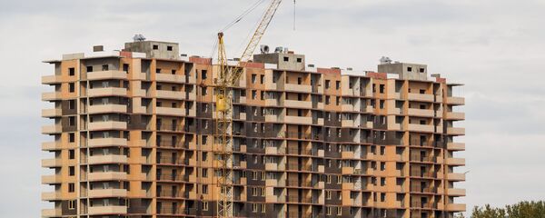Строительство многоэтажного дома, фото из архива Строительство многоэтажного дома, фото из архива - Sputnik Азербайджан