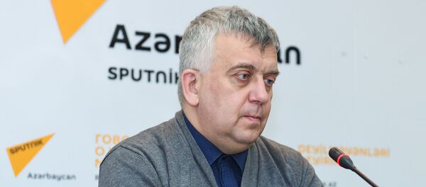 Российский политолог Олег Кузнецов - Sputnik Азербайджан