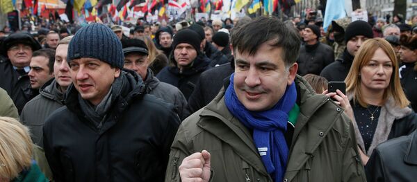 Бывший президент Грузии Михаил Саакашвили во время акции протеста в Киеве, Украина, 17 декабря 2017 года Бывший президент Грузии Михаил Саакашвили во время акции протеста в Киеве, Украина, 17 декабря 2017 года - Sputnik Азербайджан